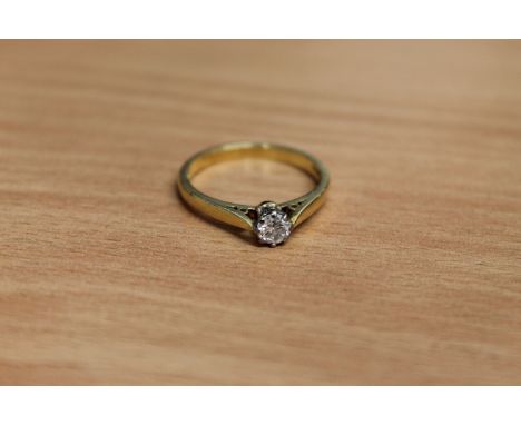 An 18ct gold diamond solitaire ring, approximately 0.25ct, size M.