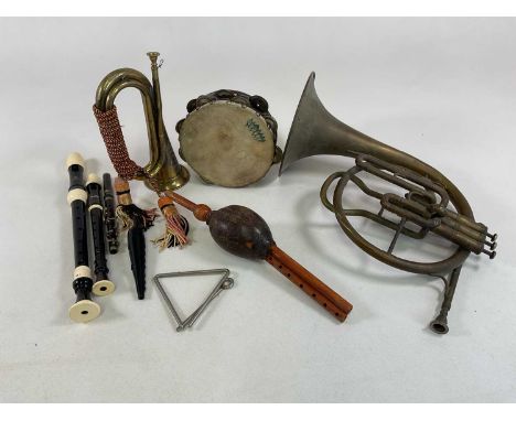 A small number of musical instruments, including a Boosey French horn, bugle, recorders, etc.