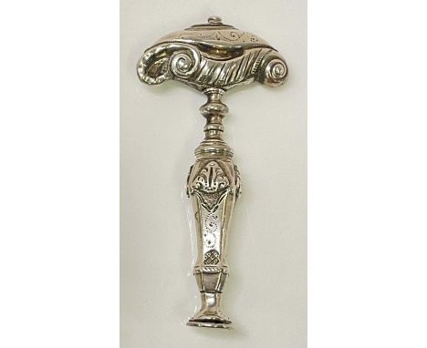 An early 19th century white metal travelling combination corkscrew/seal, the body with screw action capped with a flat seal, 