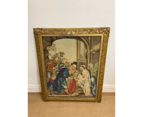 A tapestry depicting the Adoration of the Magi, 69 x 52cm, in gilt frame and glazed.
