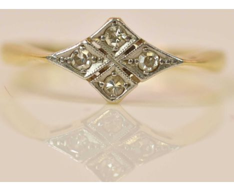 An 18ct yellow gold ring, platinum tipped in a lozenge shape and set with four tiny diamonds, size K 1/2, approx 2g.