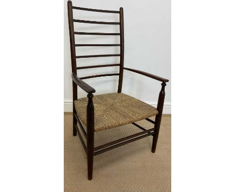 An Arts and Crafts low ladder back chair with replacement rush seat, height of back 87cm, seat height 30cm