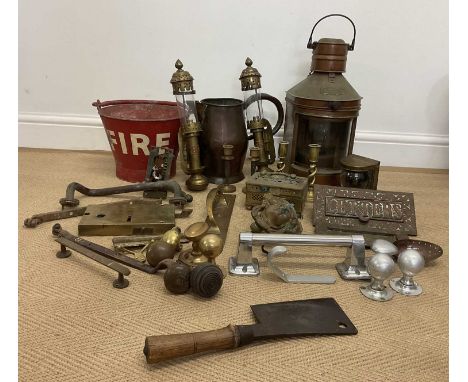 A quantity of metalware including a painted fire bucket, brass locks, brass handles, a converted ship's light and other items