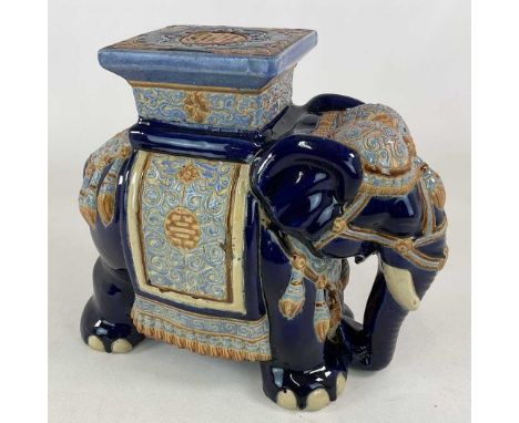 A ceramic plant pot stand in the form of an elephant, height 45cm, width 48cm.Condition Report: Some minor pre firing damage 