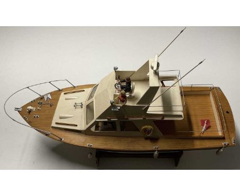 A remote control motor launch, length 90cm, with fine detailing to the whole model, single prop operated, missing control, wi