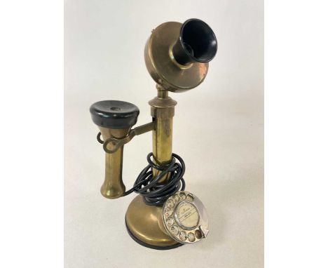 A brass candlestick telephone celebrating the Centenary of the Telephone, 1876-1976, height 34cm.
