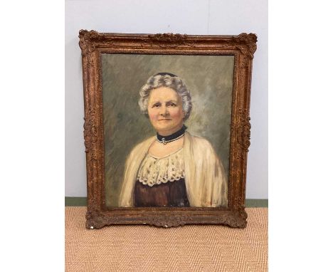 K C LLOYD; oil on canvas, portrait of a woman wearing pearl choker, signed, 61 x 50cm, framed.