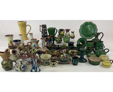 A large quantity of Torquayware comprising Allervale and Watcombe pottery items including green glaze lustre glaze teaware, c