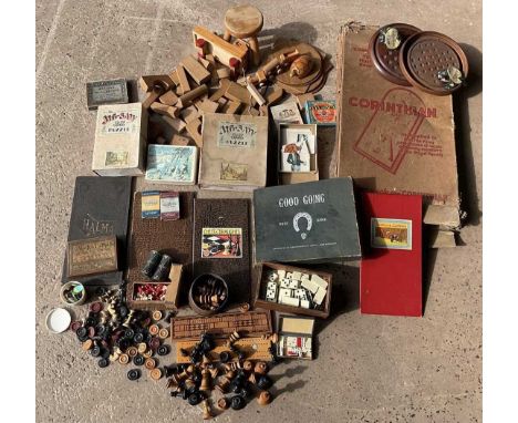 A quantity of vintage games and wooden toys, including a small bone chess set (complete), a turned and stained wooden Staunto