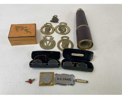 A contemporary brass three draw telescope, a small group of horse brasses, a trinket box and a vintage pair of pince-nez and 