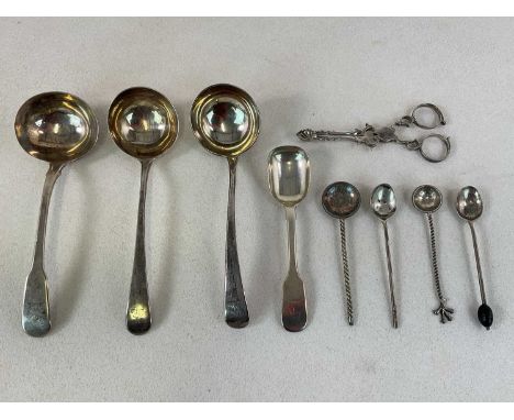 A group of silver flatware comprising three various early 19th century hallmarked silver ladles, a pair of 18th century sugar