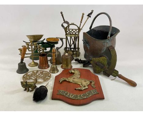 A quantity of metalware, including weighing scales, candelabrum, companion set, bells etc.
