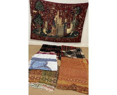 A Belgian machine made tapestry in Flemish art style also with tartan blankets, one being double faced and five throws.