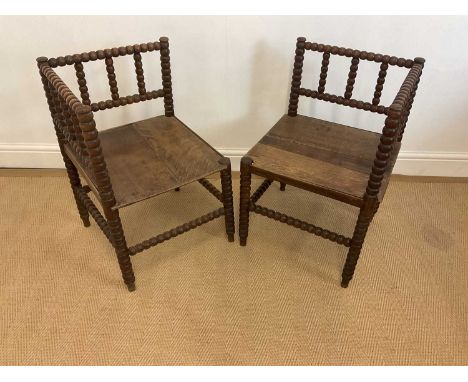 A pair of bobbin turned corner chairs, 64cm