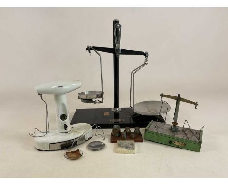 AVERY: three sets of pharmaceutical weighing scales, including some sets of weights, largest height 58cm.