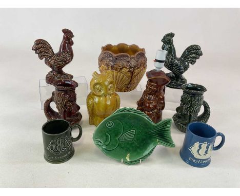 DARTMOUTH POTTERY; two mermaid jugs, cockerels, height 21cm, an owl money box, a lamp base styled as a Toby jug and other ite