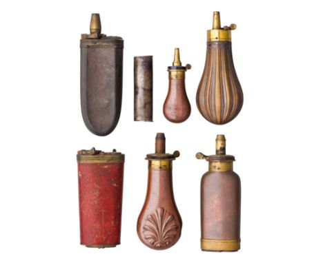 Ⓦ SEVEN PISTOL FLASKS^ CIRCA 1790-1840¦the first an iron two-way flask^ with body of oval section and a sprung cap at each en