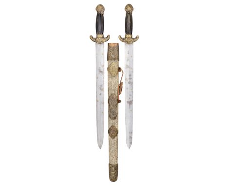 A PAIR OF CHINESE HORN AND BRASS-MOUNTED SWORDS^ QING DYNASTY^ 19TH CENTURY ¦with broad double-edged blades inlaid with seven