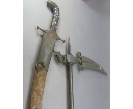 A PERSIAN SWORD (SHAMSHIR)^ QAJAR^ 19TH CENTURY AND AN INDIAN AXE (ZAGNAL)^ 20TH CENTURY¦the first with curved single-edged b