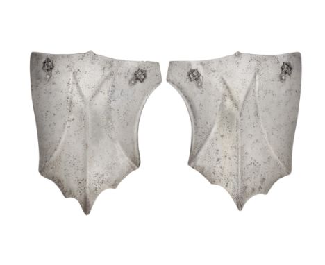 Ⓦ A PAIR OF TASSETS IN THE WESTERN EUROPEAN LATE 15TH CENTURY STYLE¦each formed of a single pendant scutiform plate^ embossed