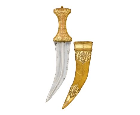 AN INDIAN DAGGER (JAMBIYA)^ 19TH CENTURY¦with broad curved medially-ridged double-edged blade^ gilt-brass hilt engraved with 