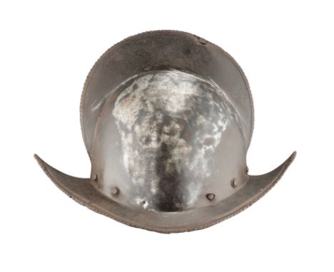 Ⓦ A NORTH ITALIAN COMB MORION^ CIRCA 1580¦with rounded one-piece crown (extensively holed on left side) rising to a tall file