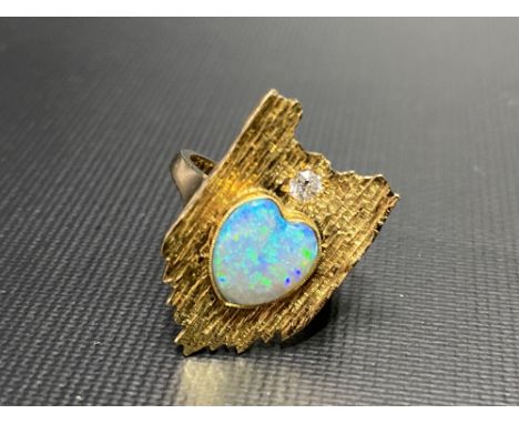 Good mid Century 18ct gold opal and diamond set ring, the heart shaped blue opal showing blue, green and mauve colours and of