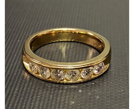 14ct gold diamond set six stone ring, the diamonds of 0.20ct spread approx, stamped 14K, weight 9.5g approx.