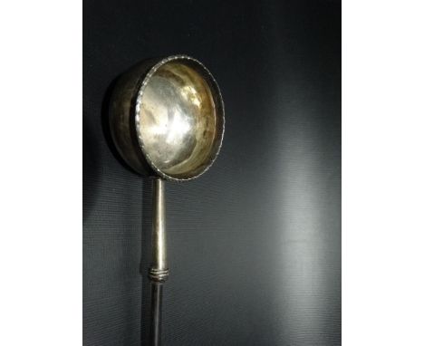 19th Century white metal toddy ladle with twisted baleen handle, length 30.5cm