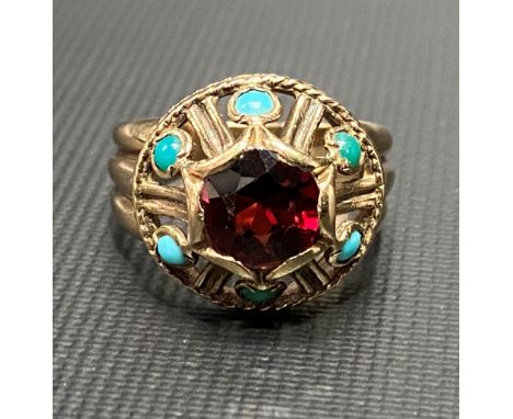 Yellow metal garnet and turquoise set dress ring, weight 4.7g approx.