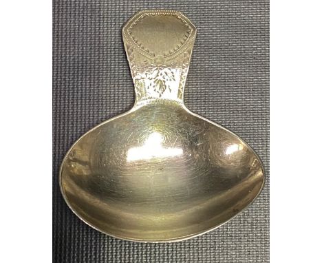 George III silver caddy spoon with oval bowl and bright cut engraved handle, maker D.C N.H?, London 1800, weight 10g approx.
