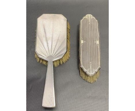 Art Deco silver engine turned hairbrush, maker C &amp; A, London 1932 together with a clothes brush, maker RC, London 1932 (2
