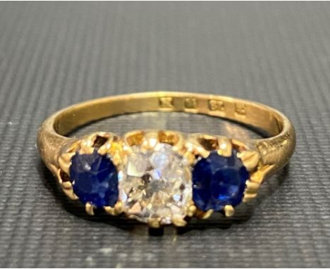 Good Victorian 18ct gold diamond and sapphire three stone ring, the central diamond of 0.50ct spread approx, the sapphires ea