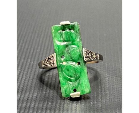 9ct green jade set ring, the setting inset with two small diamonds, weight 3.1g approx.