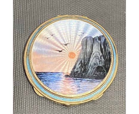 925 silver gilt guilloche coloured enamel compact, the hinged lid with a seascape at sunset with seagulls, the base also with