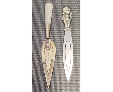 Modern silver trowel book marker with mother of pearl handle; together with another book marker with silver baby handle (2)