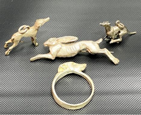 Harriet Glen silver leaping hare brooch; together with two Harriet Glen silver greyhound charms and a greyhound silver ring, 