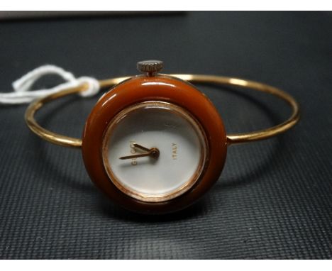 Modern Gucci ladies gold plated manual wind wristwatch, the white 13mm dial signed 'Gucci Italy'.