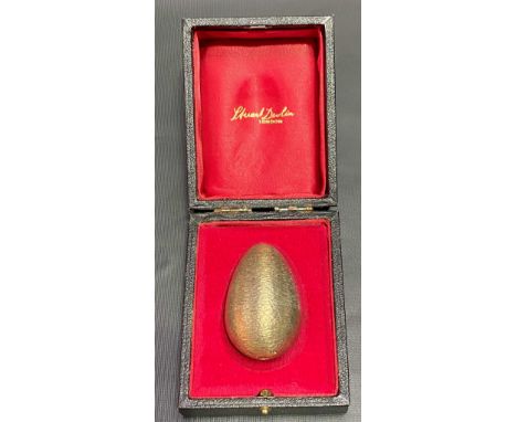 Stuart Devlin silver gilt limited edition egg, revealing Prince of Wales feathers with enamelled flowers and commemorating th