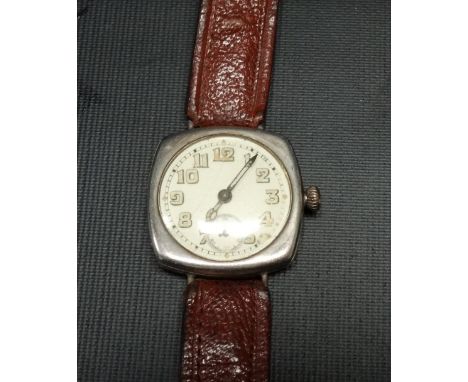Silver lug trench wristwatch, the 25mm dial with luminous Arabic Numerals and subsidiary seconds dial and within a square sha