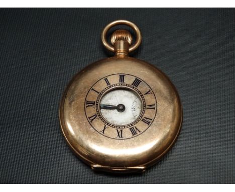 Omega gold plated crown wind half hunter pocket watch, the 23mm white enamel dial with black Roman Numerals and subsidiary se