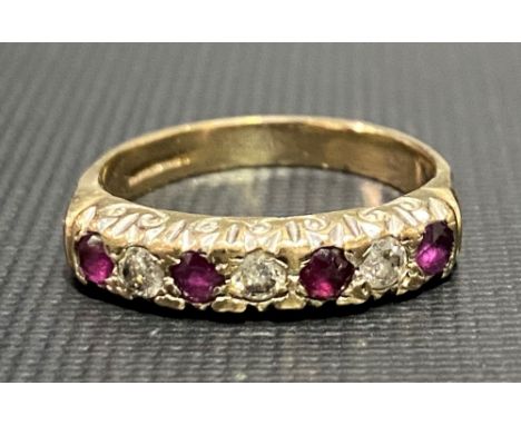 9ct hallmarked gold diamond and ruby half eternity ring set with seven stones, the three diamonds of 0.07ct spread approx, we