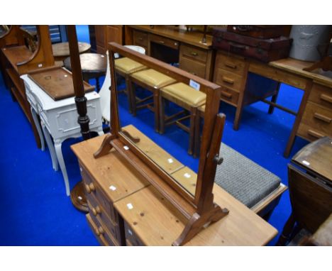 An Arts and Crafts golden oak toilet mirror, believed to be Arthur Simpson Handicrafts , unlabelled
Provenance&nbsp;Arthur Di