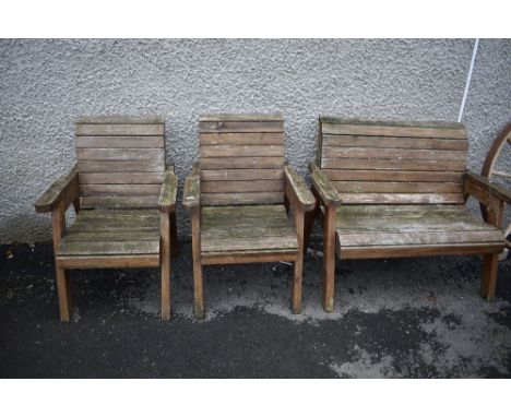 A stained wood garden bench and two similar chairs