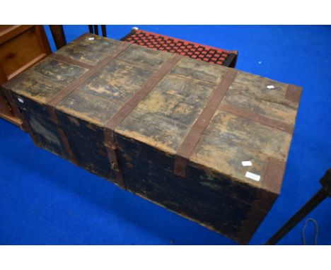 A vintage wooden travel trunk