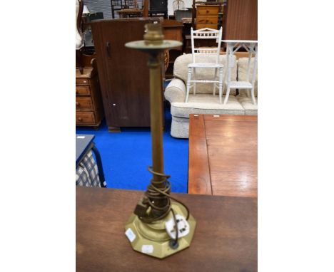 A vintage brass table lamp having octagonal base