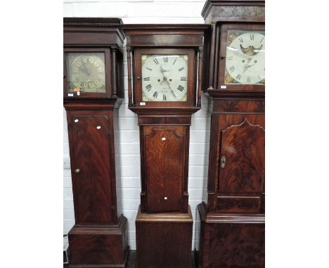 A late 18th century mahogany and oak longcase clock having square and pillar hood containing painted dial and 8 day movement 