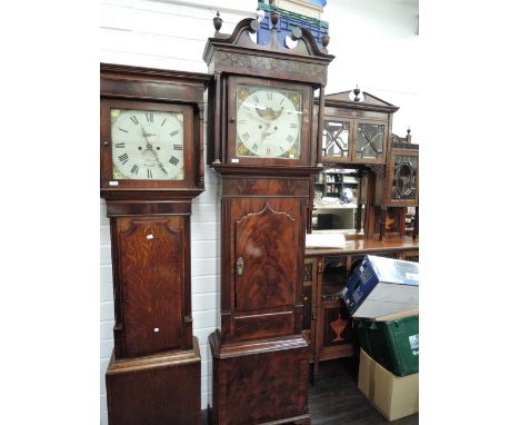 An early 19th century mahogany longcase clock having finial, swan neck and pillar hood with inlay, containing painted dial an