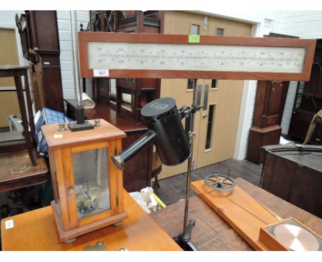A vintage Griffin & Tatlock horizontal scale with magnifier lamp and a vintage quadrant electrometer