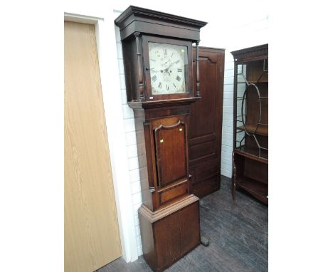 A late 18th/early 19th century oak and mahogany longcase clock having square pillar hood containing painted dial and 8 day mo